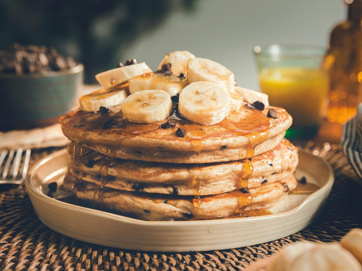 stack of chocolate chip pancakes mix with bananas
