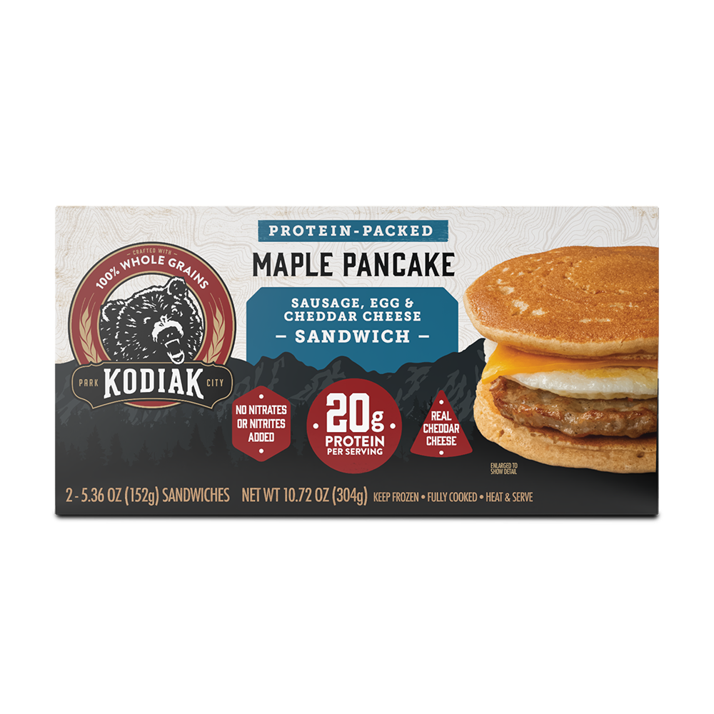 a box of protein packed Kodiak Cakes maple pancake Sausage, Egg & Cheddar Cheese Sandwich