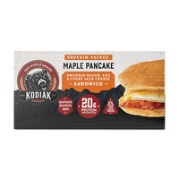a box of protein-packed Kodiak Cakes Maple Pancake Uncured Bacon, Egg, and Colby Jack Cheese Sandwich